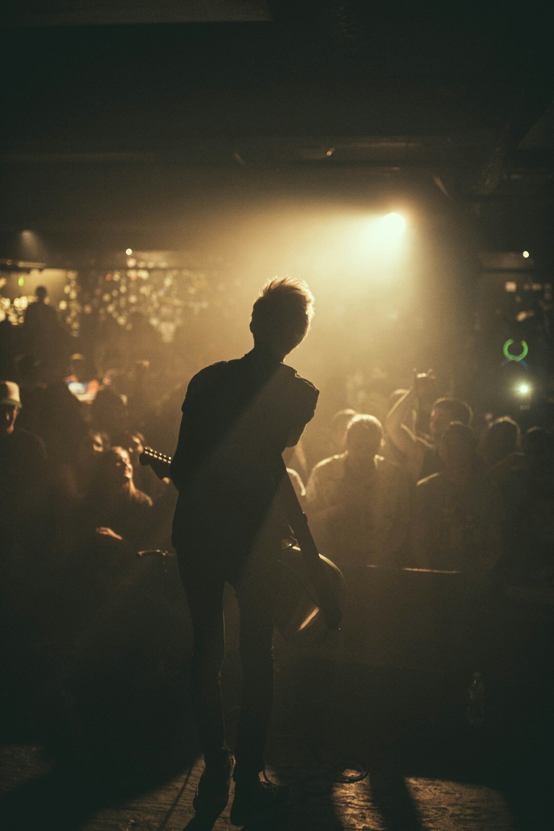 musician on stage performing